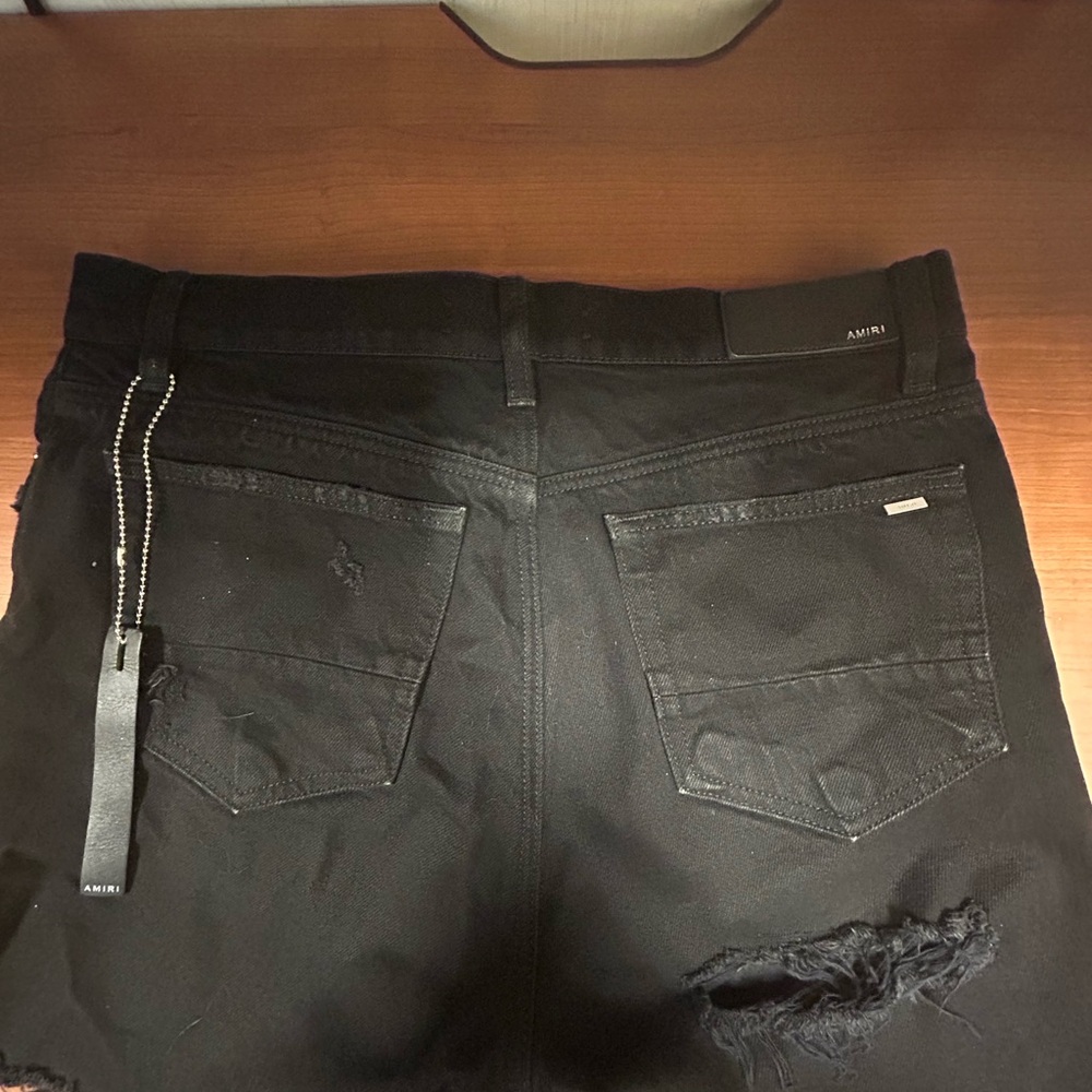 Amiri distressed shorts